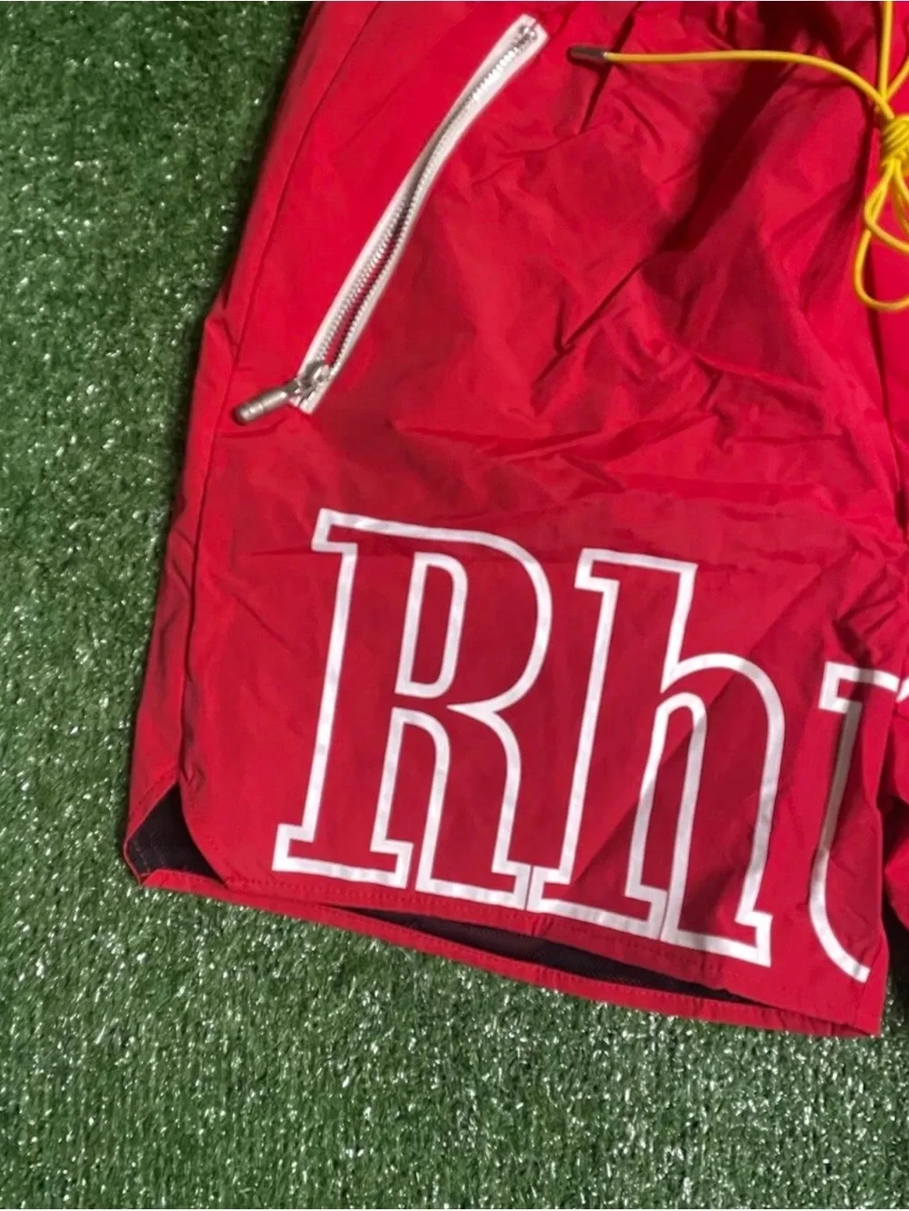 Rhude Red Swim Shorts with White Logo and Yellow Drawstring